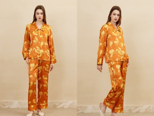 ' Embrace Luxury and Comfort with the 19 Momme Mulberry Silk Orange Print Long Sleeve Pajamas Set'